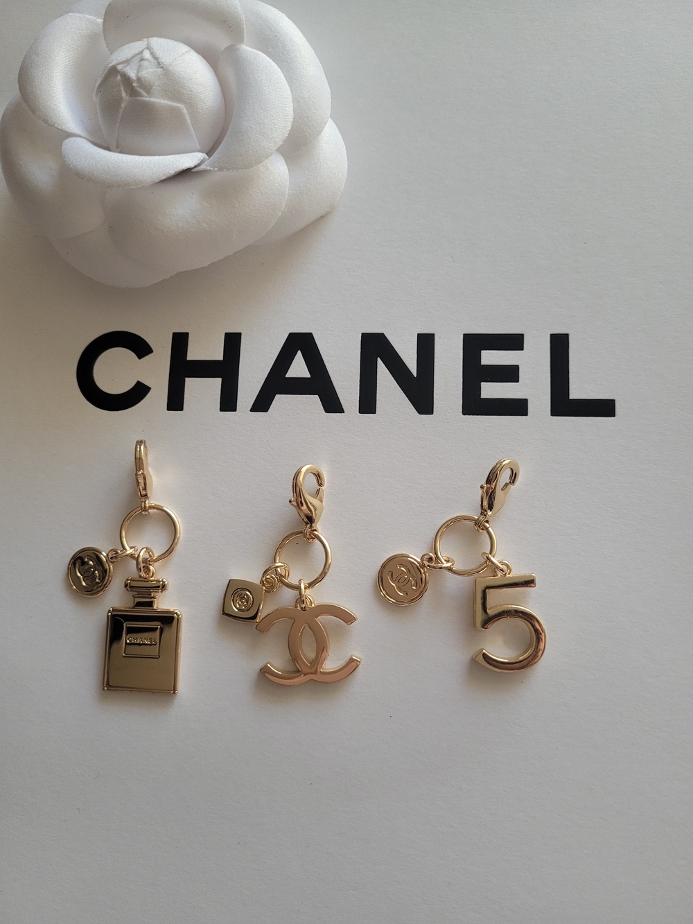 CHANEL Gold-Tone Charm Trio with Perfume Bottle, CC Logo & Number 5